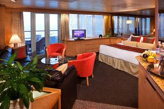 Holland America Line S-Class Accommodation Neptune Suite.jpg